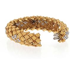 Discover the captivating allure of the David Webb Platinum & 18K Yellow Gold Warty Textured Diamond Sections Wide Bracelet. Immerse yourself in the world of fine jewelry as you adorn your wrist with this exceptional piece. Meticulously crafted by the renowned David Webb, this bracelet is a true testament to the brand's unparalleled artistry and devotion to excellence.With its unique raised bumpy design and textured accents, this bracelet exudes a sense of boldness and individuality. Each diamond Luxury Flexible Gold Bracelet For Formal Occasions, Luxury Flexible Yellow Gold Diamond Bracelet, Luxury Bracelets With Intricate Design, Luxury Flexible Gold Diamond Bracelet, Exquisite Yellow Gold Jubilee Tennis Bracelet, Exquisite Gold Bracelet With Diamond Cut, Exquisite Yellow Gold Jubilee Bracelet, Luxury Flexible Bangle For Anniversary, Flexible Luxury Bangle For Anniversary