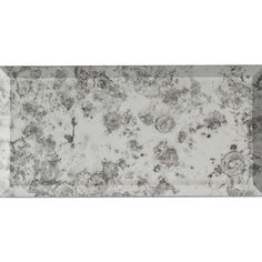 a white and grey marble tray with silver trim