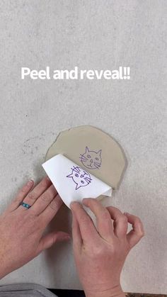 a woman is drawing on a piece of paper that says, peel and reveal