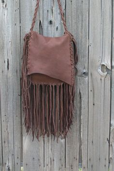 Rustic gypsy handbag ,  Fringed leather purse ,  Crossbody shoulder bag by thunderrose on Etsy https://www.etsy.com/listing/99529202/rustic-gypsy-handbag-fringed-leather Bohemian Fringe Crossbody Satchel, Hippie Brown Crossbody Shoulder Bag, Bohemian Crossbody Satchel With Fringe, Hippie Brown Shoulder Bag, Brown Bohemian Fringe Satchel, Bohemian Brown Fringe Satchel, Brown Leather Hobo Bag For Festival, Brown Bohemian Satchel With Fringe, Brown Bohemian Leather Satchel