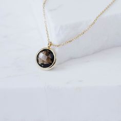 Dainty smoky quartz necklace in 14K solid gold. Simple and dainty necklace for women who love colors. The best gift for her. 100% handcrafted with love! PRODUCT DETAILS ● Material: 14K solid gold - white gold - rose gold ● Gemstone: Smoky Quartz, round briolette cut ● Stone Diameter: 10mm (0.4in) ● Length: 42cm (16.5in) to 45cm (17.5) HOW TO ORDER - CUSTOM ORDERS ●Choose from the drop down menus the available options (Metal, Length) and leave us a note for any special requirements. ●For special Smoky Quartz Pendant Necklace Gift, Smoky Quartz Pendant Necklace For Gift, Smoky Quartz Yellow Gold Jewelry Gift, Yellow Gold Smoky Quartz Jewelry Gift, Luxury Smoky Quartz Jewelry Gift, Elegant Gold Jewelry With Smoky Quartz, Classic Smoky Quartz Jewelry As A Gift, Elegant Smoky Quartz Jewelry For Anniversary, Classic Smoky Quartz Jewelry As Gift