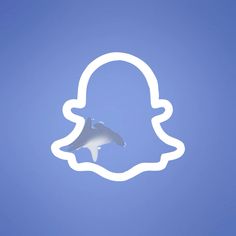 a shark swims through the sky in front of a white snapchat shaped like a person's head