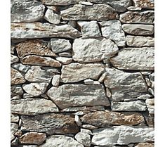 a stone wall that is made out of rocks