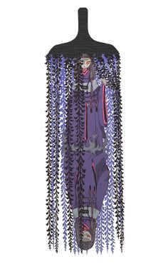 a mannequin is adorned with purple and black beads