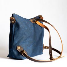 "waxed canvas convertible tote bag, convertible backpack, waxed canvas tote, large canvas tote, crossbody waxed canvas tote, tote bag, large tote, waxed canvas bag, waxed canvas crossbody bag, wax canvas bag, wax canvas tote As of March 19th, 2020, each bag purchase from In Blue Handmade gives 50 meals to a network of 60,000 food banks nationwide during this unprecedented world crisis. See listing pictures for more information, and feel free to reach out with questions Free Shipping on all order Waxed Canvas Backpack With Leather Handles For Everyday Use, Everyday Waxed Canvas Backpack With Leather Handles, Standard Canvas Backpack For Everyday Use, Everyday Cotton Backpack With Waxed Finish, Waxed Canvas Bag For Everyday Use, Canvas Backpack With Leather Handles, Waxed Finish Shoulder Bag Backpack For Everyday Use, On-the-go Waxed Canvas Bag With Adjustable Strap, Canvas Backpack With Leather Handles And Crossbody Shape