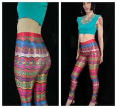 "RARE Vintage 1970's Style PETER MAX Rainbow Geometric Pop Art Shiny Nylon Spandex High Waisted Disco Pants! Wild, geometric, zig-zag pop art print. Rich, vibrant shades of candy red, cerulean blue, lime green, grape purple, pineapple yellow, fuchsia, cotton candy pink, royal blue, wine red, marigold, ballet slipper pink, tomato red, and black. Flattering high-waist design and ultra curve-hugging hips. Double back rounded pockets. Skinny legs, like a second skin. Front golden metal Talon zipper Multicolor Stretch Disco Bottoms, Summer Festival Leggings, Multicolor Fitted Leggings For Festival, Retro Festival Fitted Pants, Retro Fitted Pants For Festival, High Waist Multicolor Fitted Leggings, Funky Stretch Bottoms For Festival, Funky Fitted Summer Bottoms, Funky Fitted Multicolor Pants