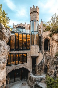 a castle like building that is built into the side of a cliff