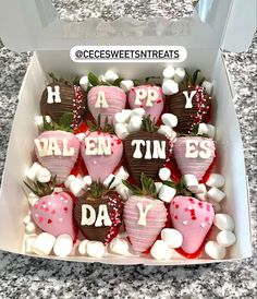 chocolate covered strawberries in a box with happy valentine's day written on them