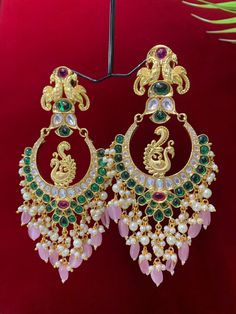 Premium quality High gold plated, pearl work, hand carved work , AD lining and kundan work. Clip back.  about 5.5 inch long  Absolute designer piece and statement earring. Luxury Kundan Danglers For Party, Luxury Jeweled Kundan Jhumkas, Luxury Traditional Kundan Chandelier Earrings, Luxury Chandbali Earrings For Ceremonial Occasions, Luxury Festive Chandbali Earrings, Cheap Chandbali Bridal Earrings For Celebration, Cheap Traditional Chandbali Jewelry, Luxury Kundan Chandelier Earrings For Diwali, Luxury Multicolor Earrings For Diwali