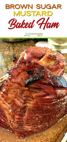 brown sugar mustard baked ham on a cutting board with the title in the middle