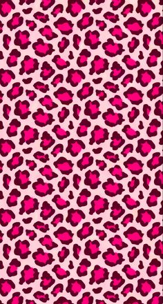 a pink and black leopard print pattern with red spots on the bottom half of it