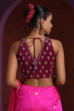 Wine blouse with hand embroidered zardozi floral motifs.
Component: 1
Pattern: Embroidery
Type Of Work: Zardozi
Neckline: V neck
Sleeve Type: Sleeveless
Fabric: Crepe
Color: Wine
Other Details: 
Low back with tie up and tassels
Closure: Front hook
Note: Saree worn by the model is not for sale
Occasion: Sangeet - Aza Fashions Sleeveless Resham Embroidery Traditional Wear For Festive Occasions, Sleeveless Traditional Wear With Resham Embroidery For Festive Occasions, Sleeveless Resham Embroidery Traditional Wear For Festive, Festive Sleeveless Traditional Wear With Resham Embroidery, Sleeveless Embroidered Traditional Wear For Festive Occasions, Festive Sleeveless Embroidered Traditional Wear, Sleeveless Anarkali Choli With Floral Embroidery, Sleeveless Anarkali With Floral Embroidery, Sleeveless Embroidered Fabric For Diwali