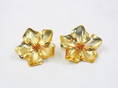 1 Pair 22kt Gold Plated Designer Flower Earrings / 42mm Handcrafted Flower Earrings / Wedding Jewelry / Gift For Her / Bridesmaid Earrings. Item Name: Designer Flower Earrings Earrings Length: 42mm approx Metal: 22kt Gold Plated Brass Qty: 1 Pair Click here to check more of our pearl earrings:- https://www.etsy.com/in-en/shop/RareGemsNJewels?ref=seller-platform-mcnav&search_query=natural+pearl+earrings Click here to check more of our gemstone earrings:- https://www.etsy.com/in-en/shop/RareGe Gold Flower Earrings For Formal Events, Gold Flower-shaped Earrings For Anniversary, Gold Flower-shaped Anniversary Earrings, Formal Yellow Flower-shaped Earrings, Yellow Gold Flower Clip-on Earrings For Gift, Gold Flower-shaped Earrings For Formal Events, Yellow Gold Flower Clip-on Earrings As Gift, Gold Flower Bridal Earrings, Elegant Yellow Flower Earrings For Wedding