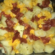 potatoes with bacon and cheese in a pan