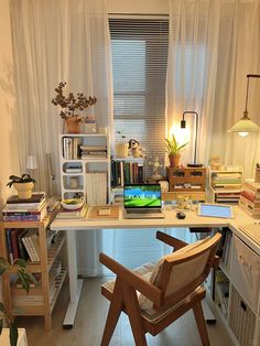 a chair sitting in front of a desk with a laptop computer on top of it