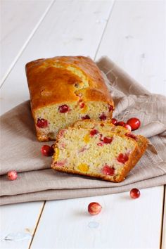 a loaf of cranberry bread on top of a cloth