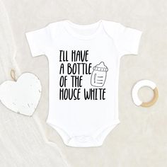 a baby bodysuit with the words i'll have a bottle of the house white on it