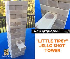 there is a small wooden tower made out of bricks and wood blocks with the words, little tipsy'jello shot tower