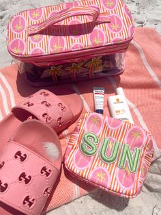 the cutest pink palm sun mini yet! This pink palm print is the perfect bag to hold your sunglasses, chapsticks, phone, and more! Patches sewn on + ships immediately Pair it with our snap clear pouch, open top, beach bum xl, or swim bag for a matching set! Beautiful artwork in collaboration with Fete Papier! Dimensions: 10 x 3 x 5.5 inches Pink Poolside Bags For Beach Season, Summer Pink Bags For Poolside, Casual Pink Poolside Bag, Summer Vacation Bags With Zipper Pouch, Summer Vacation Bag With Zipper Pouch, Pink Beach Bag With Zipper Pouch, Pink Vacation Bag With Zipper Pouch, Fun Pink Vacation Bag, Pink Palm Tree