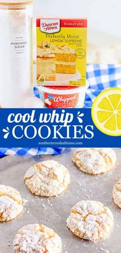 cookies cooling on a baking sheet with lemons next to it and a bottle of cool whip's