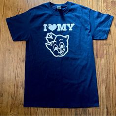 This Is A Piggly Wiggly T-Shirt. T-Shirt Is Brand New And Is A Unisex T-Shirt In Size Medium. T-Shirt Is Navy Blue Colored With A White Graphic That Says “I My Pig” With A Graphic Of The Piggly Wiggly Mascot. Piggly Wiggly Shirts Are A Novelty Item! Don’t Miss Your Chance To Add This T-Shirt To Your T-Shirt Collection. Willing To Consider Reasonable Offers Blue Graphic Tee With Heart Graphic, Blue Graphic Tee With Heart Design, Pig Graphic, Grinch Shirts, Piggly Wiggly, Superman T Shirt, Pregnancy Tshirts, Mom Tees, Retro Shirts