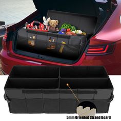 an open trunk with stuffed animals and other items in it next to a red car