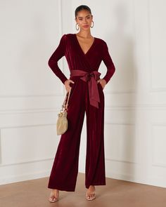 Fancy meets festive in the Love One Another Velvet Pocketed Cutout Back Jumpsuit. It features a satin waist tie that can be formed into a bow and a draped, V-neckline that's classy yet inviting. This trendy, versatile look is complete with a comfy, elastic waistband and barely-there side pockets. Draped V-neckline with snap button Elastic waistband Pocketed Satin waist tie Velvet fabrication Back center opening Neckline button closure Self & Contrast: 95% Polyester 5% Spandex Elegant Belted Jumpsuits And Rompers For Party, Elegant Belted Jumpsuit For Party, Elegant Belted Jumpsuit For Date Night, Elegant Belted Jumpsuits For Night Out, Satin V-neck Jumpsuits And Rompers For Party, Chic V-neck Jumpsuits And Rompers For Holiday, Satin Jumpsuit With V-neck For Party, Party Satin V-neck Jumpsuits And Rompers, Satin V-neck Jumpsuit For Party