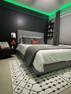 a large bed sitting in a bedroom on top of a white and black carpeted floor