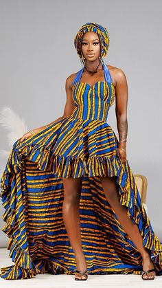 No one can deny the elegance of this effortlessly stunning African dress, crafted from vibrant blue and yellow Ankara fabric. The sleeveless design highlights your shoulders, while the high-low hemline with ruffles adds a playful touch. This dress is perfect for commanding attention at any special occasion. Perfect for The Uche African Print Dress is perfect for all sorts of functions. Formal events Birthday celebration Casual gatherings Features Ruffles high low hemline Back zip fastening Hlate Yellow Ankara Fabric, Wax Packaging, Yellow Ankara, Neck Bow Tie, Mini Dress Formal, Neck Bow, African Print Dress, Bow Dress, Ankara Fabric