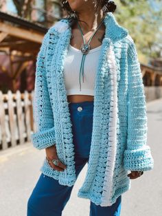 Our Reworked Crochet Jacket offers a cozy and cute piece for any cold weather. Crafted from thick knit crochet blankets, the open fit provides extra comfort and warmth. 24" across (pit to pit) 29" long (neck to hem) Crochet Long Sleeve Outerwear One Size, Cozy Long Sleeve Acrylic Yarn Outerwear, Bohemian Chunky Knit Long Sleeve Outerwear, Cozy Winter Crochet Outerwear, Cozy Oversized Crochet Outerwear, Cozy Crochet Outerwear One Size, Oversized Crochet Outerwear For Winter, Oversized Crochet Outerwear For Fall, White Crochet Outerwear For Fall