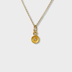 Mini, Rhythm of Life, Charm, Solid 24K Gold and 0.02ct Diamond Size - Very Small Charm (Looks great paired and layered with other charm pendants) 1 Diamond - 0.02cts 24K Solid Gold - 0.81 grams THE STORY The Rhythm of Life charm pendant is rich in meaning and beautifully symbolic, representing the past, the present and the future. The circle is also a symbol of eternity and the hole in the middle represents a door leading to things that are as yet undiscovered. Bozeman Mt, Small Charms, Diamond Charm, Circle Of Life, Greek Goddess, Diamond Sizes, Charm Pendant, Solid Gold, Jewelry Necklace Pendant