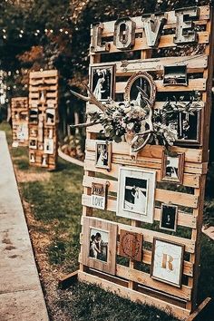 a wooden sign that has pictures on it