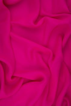 Shocking Pink Silk Double Georgette Fabric is a remarkably durable, lightweight premium silk that offers an extremely graceful drape and a soft, dull finish. This fabric is ideal for blouses, gowns, dresses, and overlays. The fabric's soft, airy appearance also makes it suitable for scarves and other accessories. The fabric is sold by the Yard, and measures 44 inches in width. Shocking Pink, Dupioni Silk, Organza Fabric, Georgette Fabric, Silk Wool, Pink Silk, Wool Fabric, Dark Pink, Beautiful Fabric