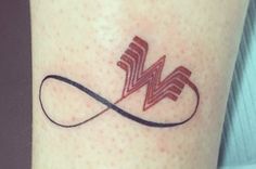 a tattoo with the letter w on it