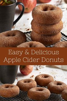 apple cider donuts stacked on top of each other with apples in the background