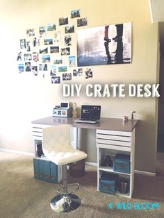 a desk and chair in a room with pictures on the wall above it that says diy crate desk