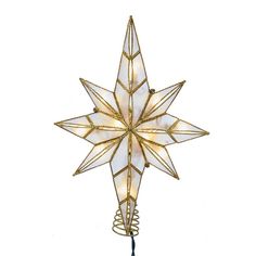 a lighted star ornament hanging from a string on a white background with gold trimmings