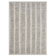 a gray and white rug with vertical stripes