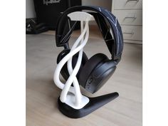 a pair of headphones sitting on top of a desk