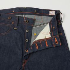 Hailing from one of the most beloved periods of denim design, Lee Archives' reproduction of this 1930 model jean is nothing short of brilliant. Cut from a 12.5 ounce fabric, this wide legged, high rise model has been designed for comfort when in the saddle. A set of ‘Lee Unionalls’ donut buttons adorns the waist, to allow suspender to be easily attached, while a custom manufactured cinch back has been added to adjust the shape. Branded copper rivets can be found throughout, including the ‘cowboy Manufacturers Clothing, Adjustable Jeans, Wide Straight Jeans, Thrift Fits, Denim Clothes, Model Jeans, Selvedge Denim Jeans, Lee Denim, Vintage Cowboy