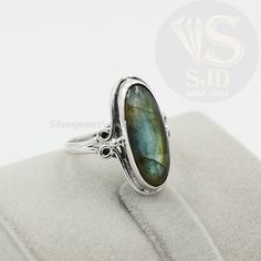 Labradorite Ring, 925 Sterling Silver, Labradorite 8x20 mm Oval Ring, Silver Ring, Gemstone Ring, Womens Ring, Boho Ring, Statement Ring ---------------------------------------------------------------------------------------------------------------------------------------------------- Style- Solid 925 Sterling Silver Ring Gemstone- Natural Labradorite Shape - Oval Shape Stone Size - 8x20 MM Weight- 4.50 Grams Approx. ------------------------------------------------------------------------------- Oval Labradorite Ring Stamped 925, Oval Ring Silver, Handmade Clay Jewelry, Womens Ring, Oval Ring, Oval Rings, Labradorite Ring, Ring Boho, India Post