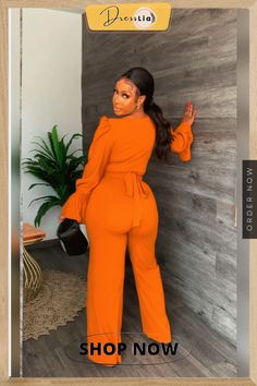 Flare Sleeve Crop Top and Wide Leg Pants Sets Non-stretch Solid Color Wide Leg Pants For Fall, Solid Wide Leg Jumpsuits For Fall, Solid Color Wide Leg Jumpsuits For Fall, Solid Wide Leg Pants For Fall Day Out, Wide Leg Solid Color Pants For Fall Day Out, Solid Wide Leg Pants For Day Out In Fall, Orange Long Sleeve Jumpsuit For Fall, Wide Leg Jumpsuits For Fall, Chic Orange Long Sleeve Jumpsuits And Rompers