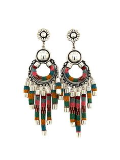 Bold and beautiful, these chandelier earrings mix the classic with the traditional. The sterling silver is accented by the incorporation of Peru's traditional weaving of bright colors in the charms. This unique (and fun!) statement piece will instantly liven up any outfit. Product Details: 950 Solid Sterling Silver Woven Textile Weight: 10.7 g each Drop Length: 2 ¾” Total Length: 3 ⅜" Handcrafted in Peru Woven Chandelier, Sterling Silver Jewelry Earrings, Weaving Textiles, Traditional Weaving, Bold And Beautiful, Chandelier Earrings, Peru, Bright Colors, Statement Pieces