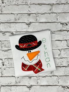 "Kids Christmas Shirt, Frost The Snowman Shirt, Snowman Head, Christmas Tee, Embroidered Shirt, Merry Christmas Shirt PROCESSING TIME IS CURRENTLY 1-3 DAYS. This does not include shipping which is another 3-5 business day. If you need an item before this time, you can choose the rush option at check out. Please message me for any rush order request. (a rush fee may be required) Fonts, age and colors can be customized. Please feel free to send me a message for any customization.  PLEASE NOTE: I do not except refunds on customized items but if you have any issues with your order, please message me. This shirt is made using high quality AJ Blank shirts. They are true to size and 100 % cotton.  *Please refer to the picture of the sizing chart for the shirt\" This shirt comes in Puff sleeves fo Frost The Snowman, Blank Shirts, Kids Christmas Shirt, Snowman Head, Snowman Shirt, Birthday Pins, Event Shirts, Cute Happy Birthday, Christmas Shirts For Kids