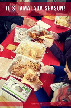 several people sitting at a table with food in plastic containers on it and the words, it's tamalada season