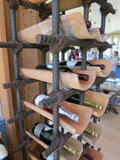 a wine rack filled with lots of bottles