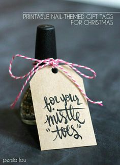 a small bottle with a tag that says, for your mistle toes the holidays are approaching and especially you are thinking about it