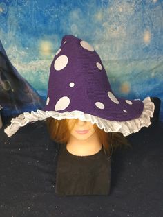 This adorable Mushroom style Witch Hat is fabulous for your everyday wear! Halloween isn't just a day, it's a way of life! Your everyday witch can show off her glamour magic by adorning this hat. It's also great for decor if you just want that extra aesthetic to brighten your home. Don't worry, if you're still in the Broom Closet, you can wear this without fear! **Hat may have some slight discrepancy in where dots are placed or what trim is available as these are made to order** Mushroom Witch, Mushroom Style, Broom Closet, A Way Of Life, Costume Hats, Knitted Hat, Witch Hat, Way Of Life, Dark Purple