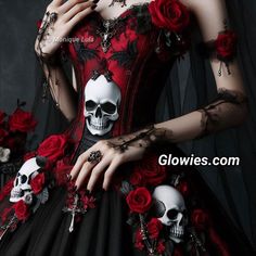 a woman in a red and black dress with skulls on her arm, holding roses