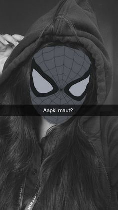 a woman wearing a spider man mask with the caption, askki mau?